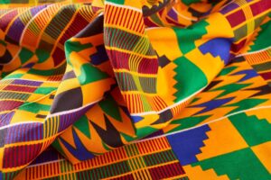 Traditional Kente patterns showing gold, green, and red colors