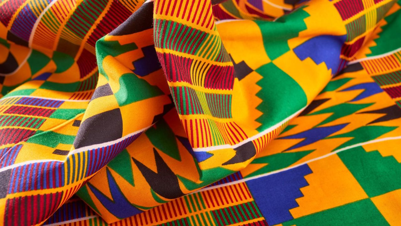 Traditional Kente patterns showing gold, green, and red colors